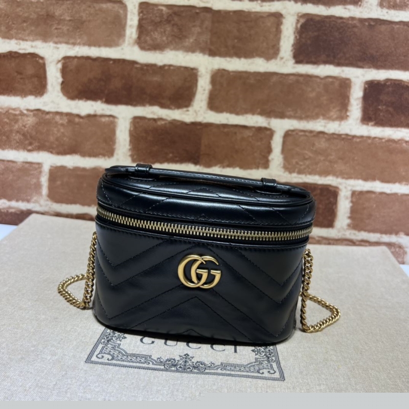 G*u*i cosmetic bags